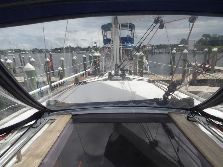 Magic Carpet Yacht Photos Pics Jeanneau Sun Odyssey 36i sailboat docked at marina, view from cockpit, 2010 model.