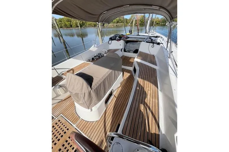 Rising Sun Yacht Photos Pics 2016 Jeanneau Sun Odyssey 50 DS sailboat with teak deck and covered cockpit.