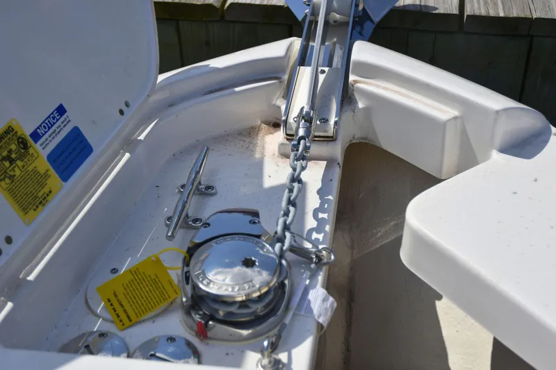  Yacht Photos Pics 2024 Pursuit DC 246 Dual Console anchor chain and winch detail.