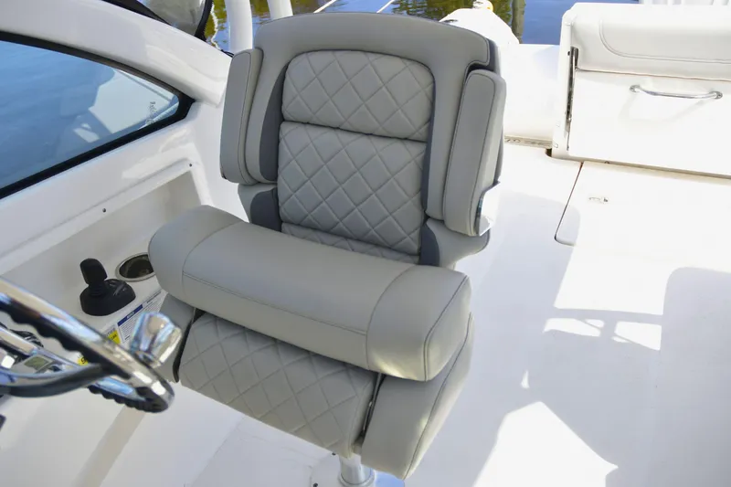  Yacht Photos Pics 2024 Pursuit DC 246 Dual Console boat seat with quilted upholstery design.