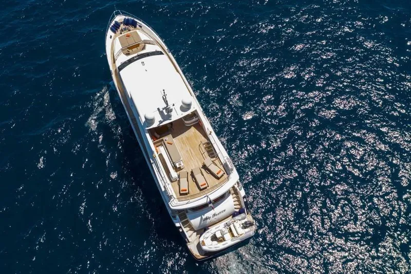 Mira Yacht Photos Pics Aerial view of 2013 Princess 98 Motor Yacht cruising on open sea.