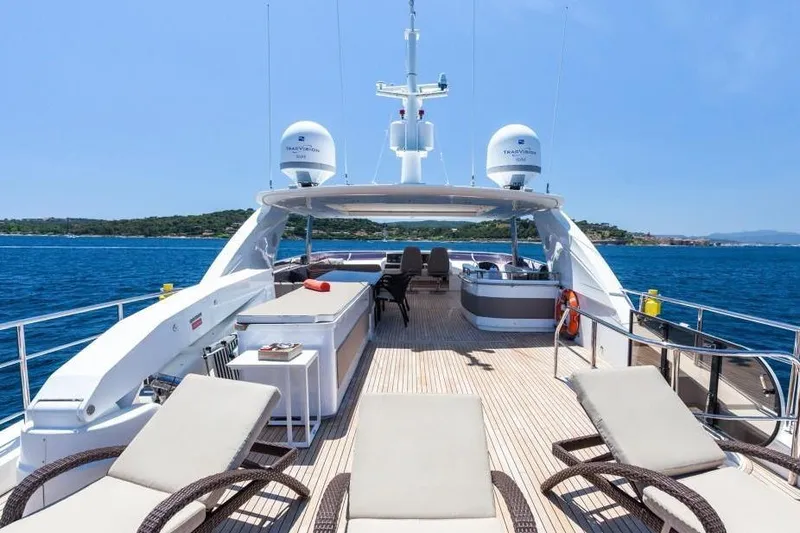 Mira Yacht Photos Pics Luxurious 2013 Princess 98 Motor Yacht deck with sun loungers and ocean view.