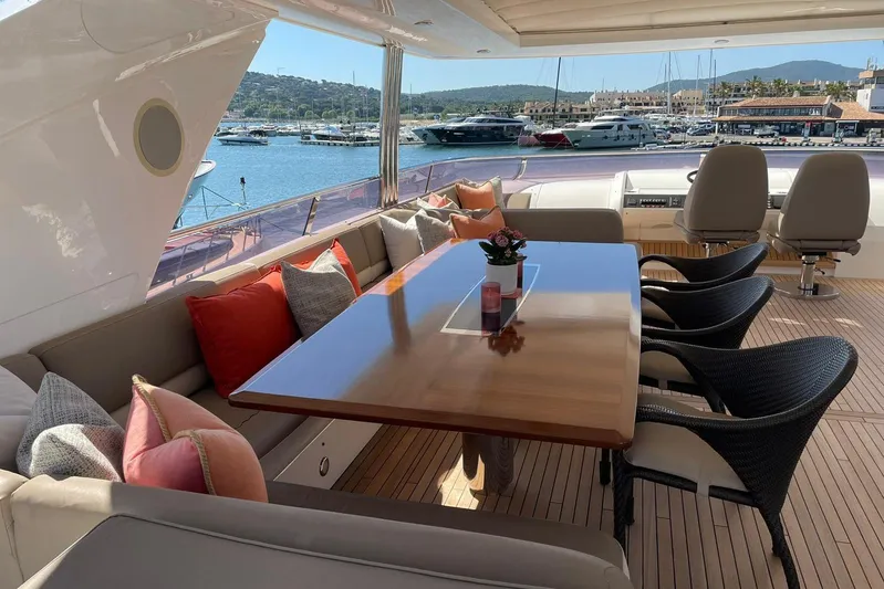 Mira Yacht Photos Pics Luxurious 2013 Princess 98 Motor Yacht deck with elegant seating and scenic marina view.