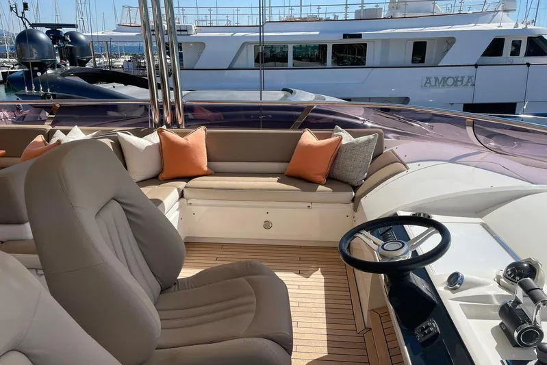 Mira Yacht Photos Pics Luxurious 2013 Princess 98 Motor Yacht interior with plush seating and elegant helm.