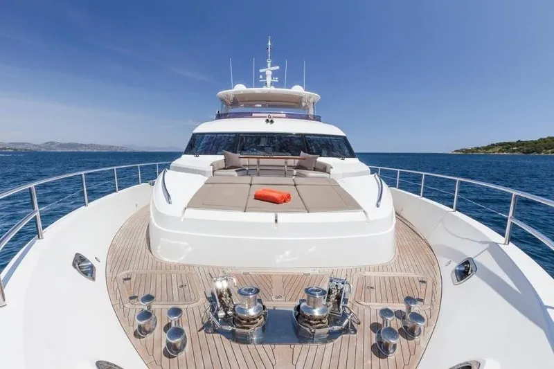 Mira Yacht Photos Pics Luxurious 2013 Princess 98 Motor Yacht on open sea, featuring spacious deck and sunbathing area.
