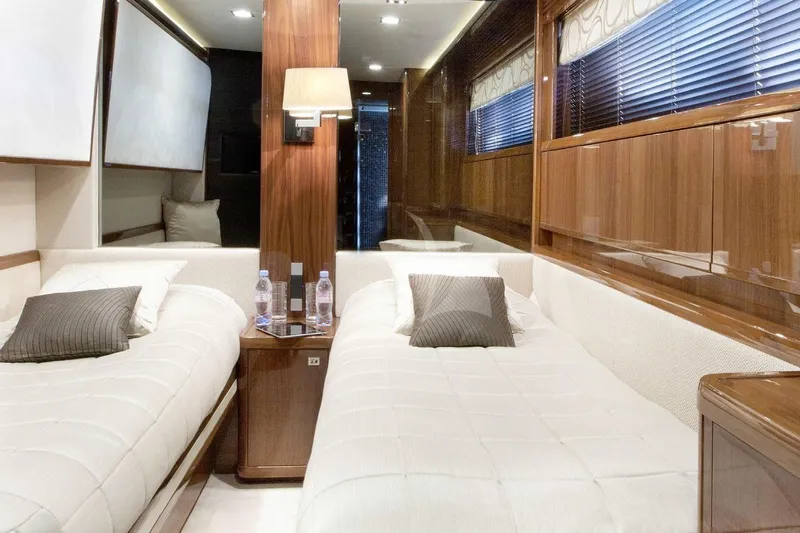 Mira Yacht Photos Pics Luxurious interior of 2013 Princess 98 Motor Yacht with twin beds and elegant decor.