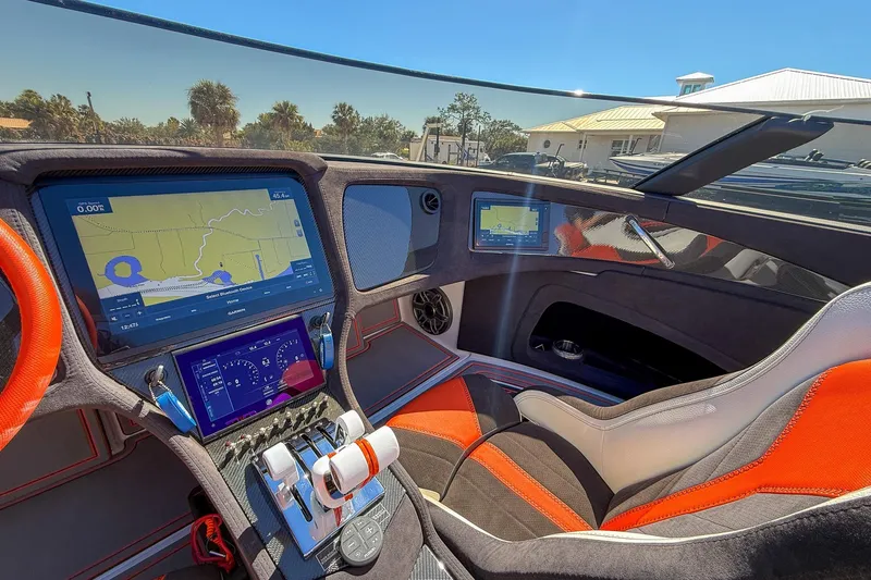  Yacht Photos Pics Interior of 2021 MTI 390X boat with advanced navigation system and sporty seating.