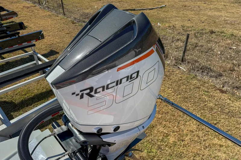  Yacht Photos Pics MTI 390X 2021 boat engine with carbon fiber cover and "Racing 500" branding.