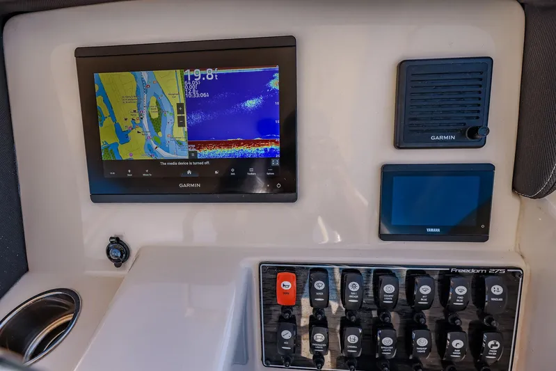 Fin & Tonic Yacht Photos Pics 2024 Grady-White Freedom 275 dashboard with Garmin navigation and control panel.