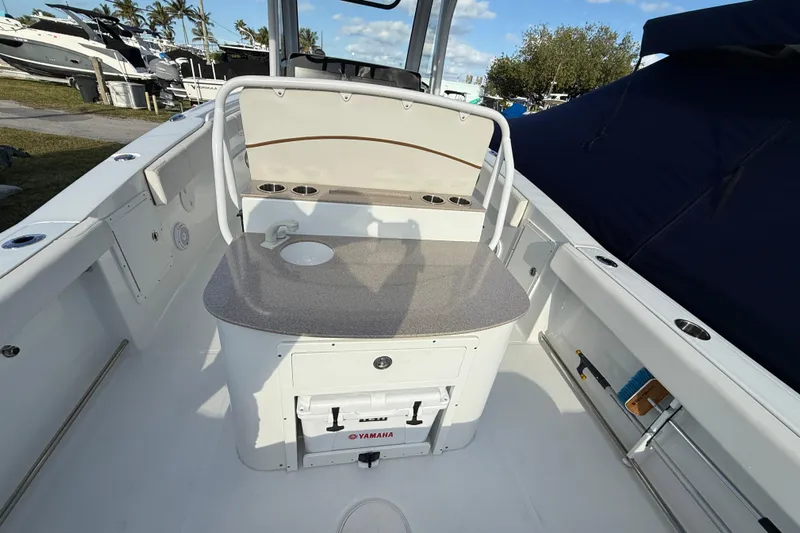  Yacht Photos Pics 2021 Sea Hunt Ultra 305 SE boat interior with seating and storage.