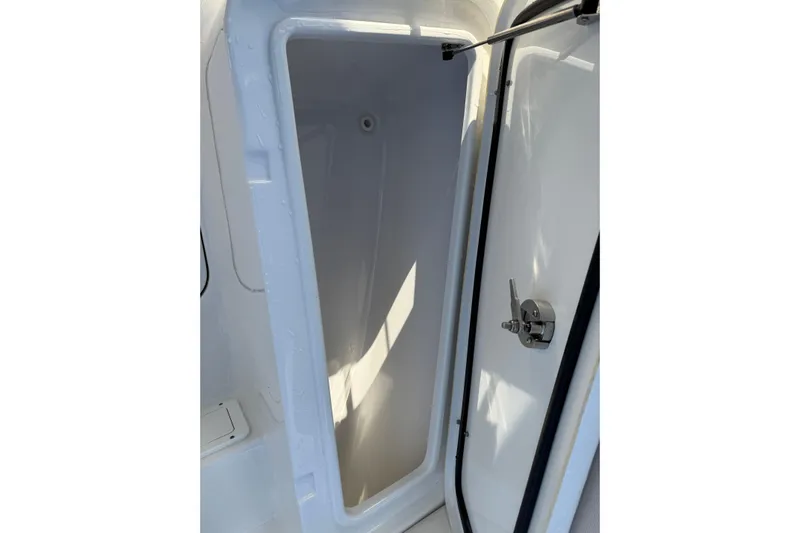  Yacht Photos Pics 2021 Sea Hunt Ultra 305 SE storage compartment with open hatch and secure latch.