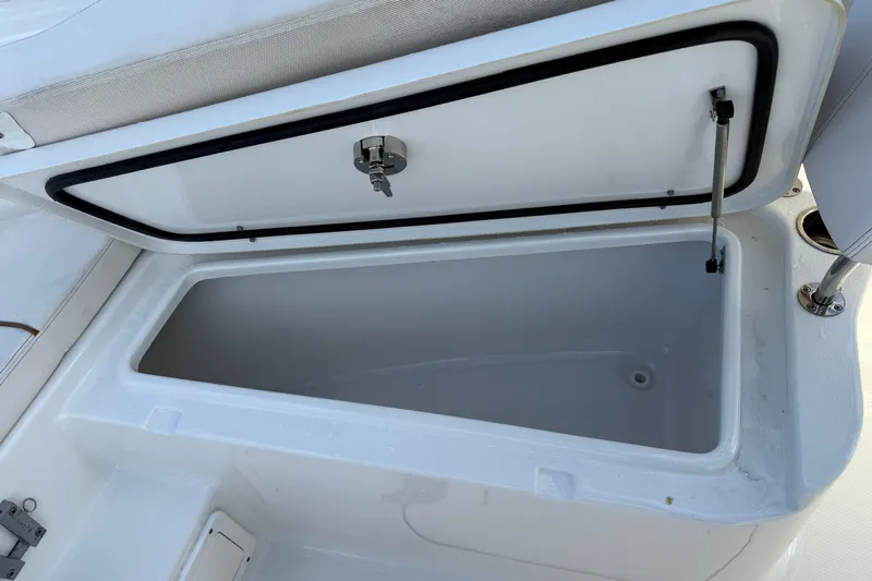  Yacht Photos Pics Open storage compartment on 2021 Sea Hunt Ultra 305 SE boat.