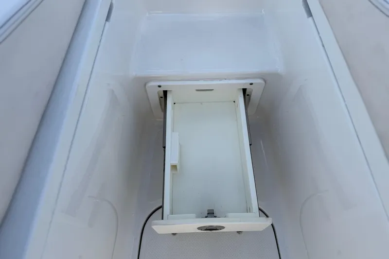  Yacht Photos Pics Storage compartment on a 2021 Sea Hunt Ultra 305 SE boat.