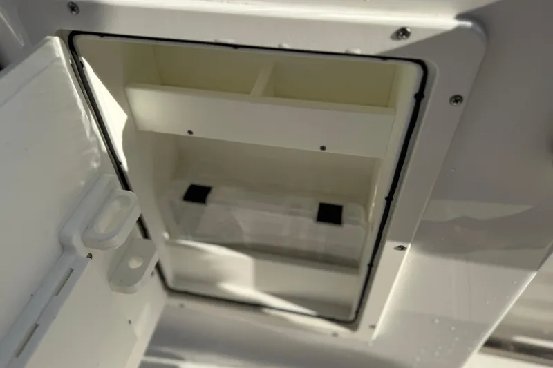  Yacht Photos Pics Open storage compartment on 2021 Sea Hunt Ultra 305 SE boat.