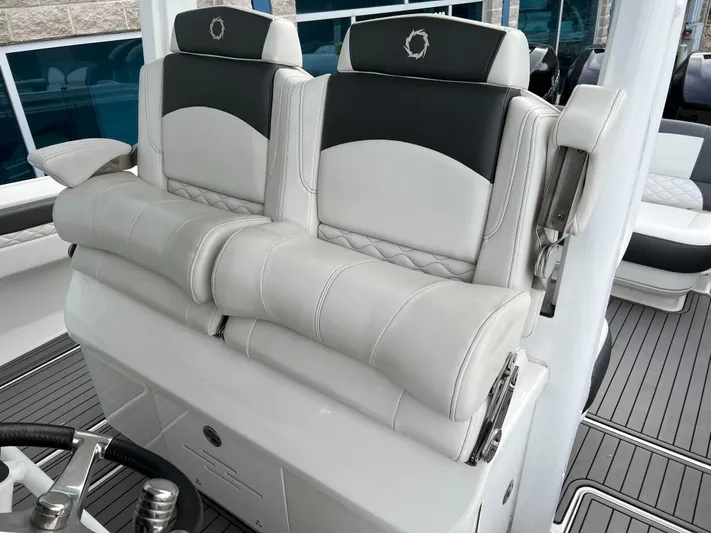 Perseverance Yacht Photos Pics 2019 Fountain 39 NX boat seats with luxurious white and black upholstery.