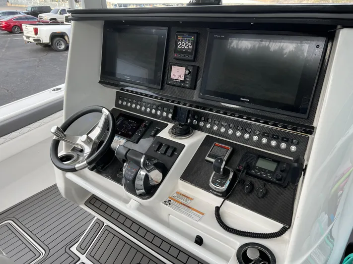 Perseverance Yacht Photos Pics Control panel of a 2019 Fountain 39 NX boat with advanced navigation systems.