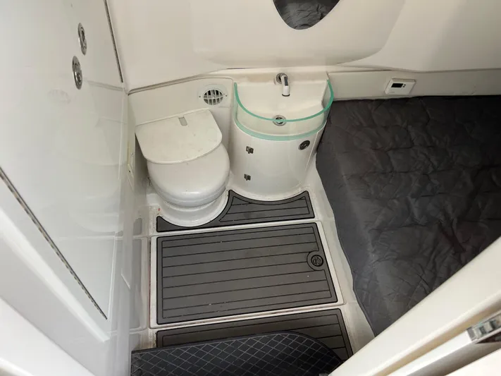 Perseverance Yacht Photos Pics Compact bathroom in 2019 Fountain 39 NX boat with toilet and sink.