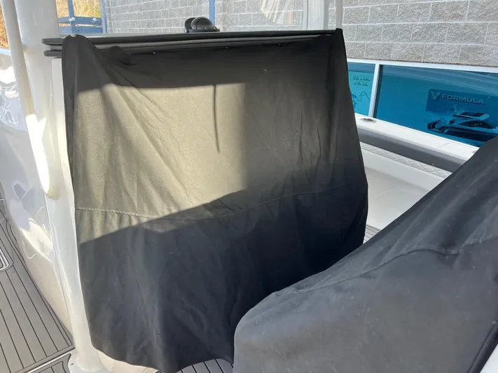 Perseverance Yacht Photos Pics 2019 Fountain 39 NX boat interior with covered console, showcasing sleek design and modern features.