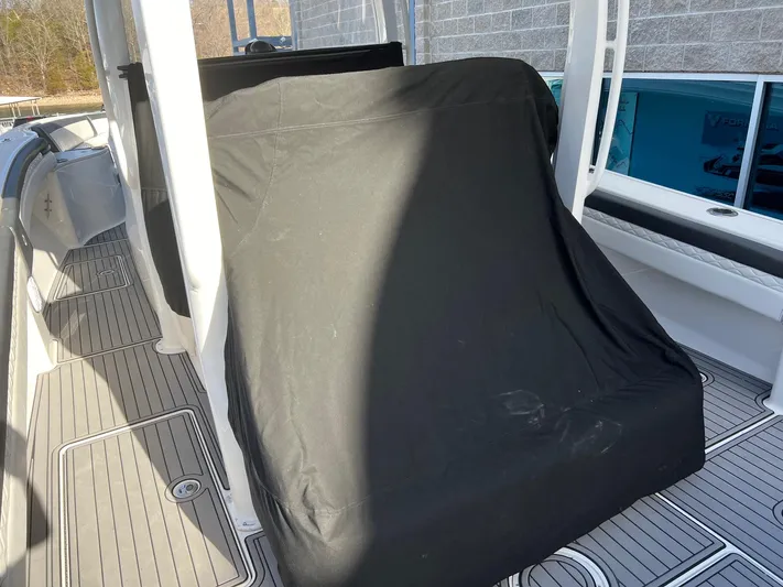 Perseverance Yacht Photos Pics 2019 Fountain 39 NX boat interior with covered seating area.