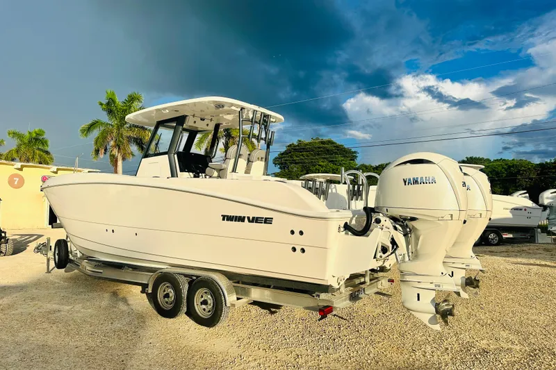  Yacht Photos Pics 2025 Twin Vee 260 GFX2 CC boat with Yamaha engines on a trailer.