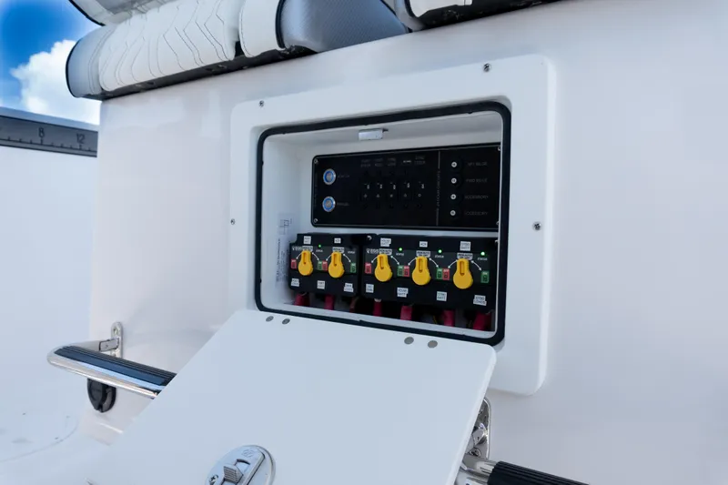  Yacht Photos Pics Electrical panel on 2025 Twin Vee 260 GFX2 CC boat, featuring control switches and wiring.