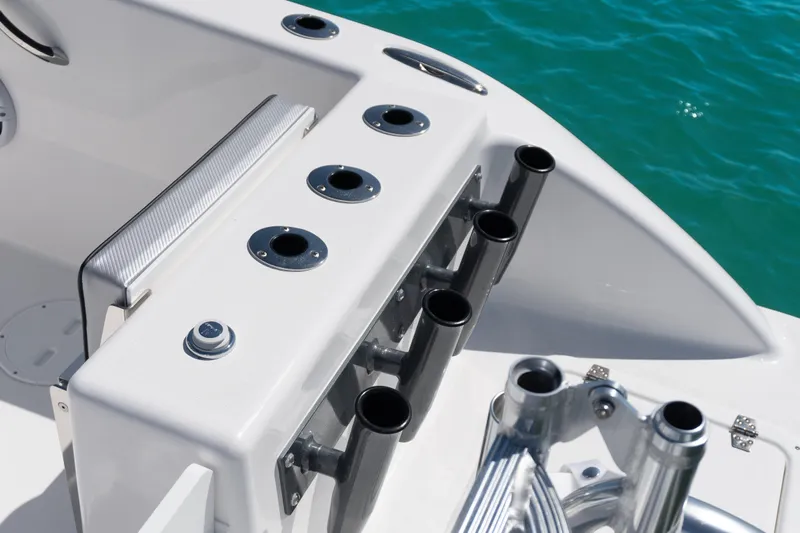  Yacht Photos Pics Close-up of 2025 Twin Vee 260 GFX2 CC boat's rod holders and deck details.