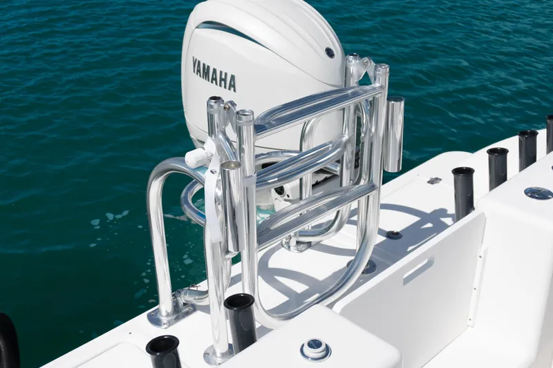  Yacht Photos Pics 2025 Twin Vee 260 GFX2 CC boat with Yamaha engine on clear blue water.