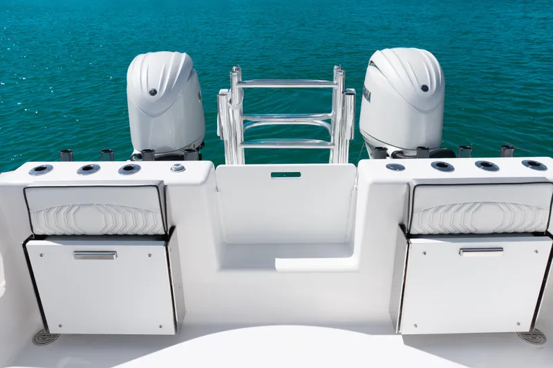  Yacht Photos Pics 2025 Twin Vee 260 GFX2 CC boat with dual engines on blue water.