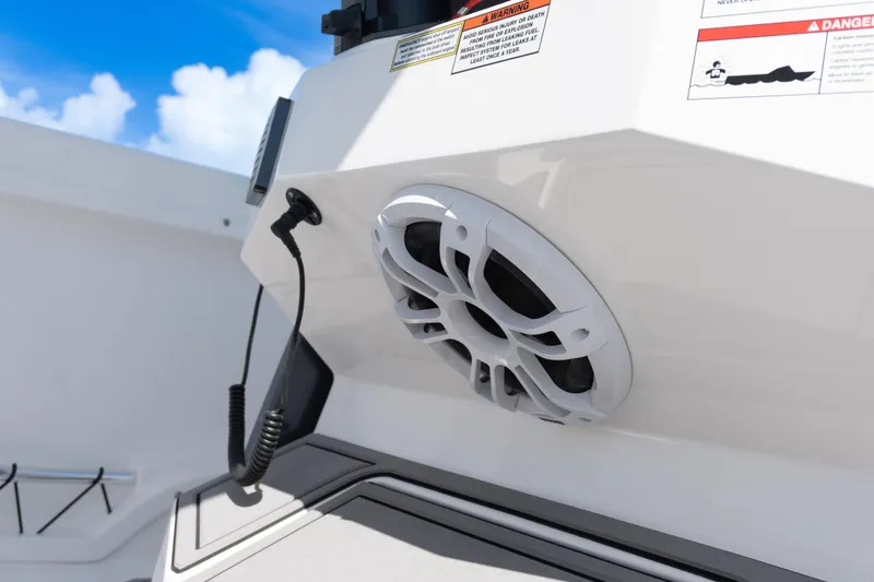  Yacht Photos Pics 2025 Twin Vee 260 GFX2 CC boat speaker and control panel, under clear blue sky.