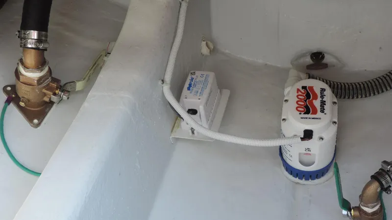  Yacht Photos Pics 2024 NorthCoast 285HT bilge area with pump and wiring components.
