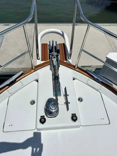 C'est Bon Yacht Photos Pics 2005 Beneteau Swift Trawler 42 bow with anchor system and stainless steel railings.