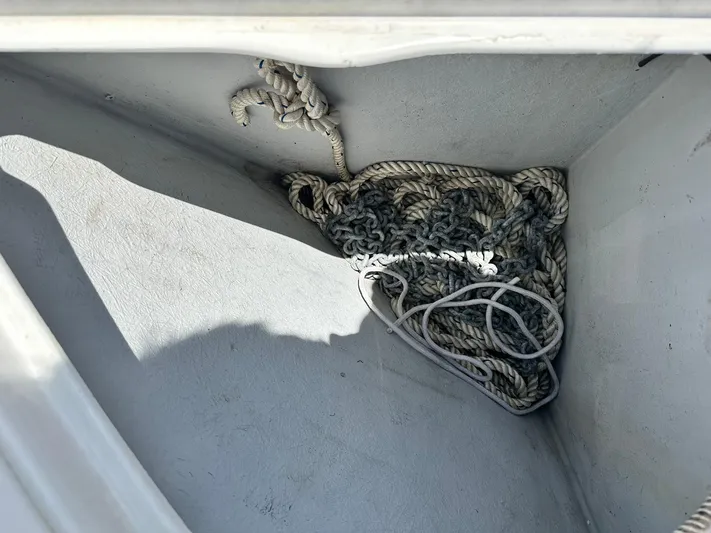C'est Bon Yacht Photos Pics Coiled rope in storage compartment of 2005 Beneteau Swift Trawler 42.