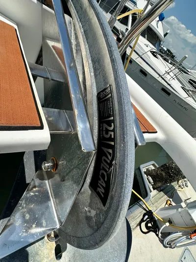 C'est Bon Yacht Photos Pics Anchor on 2005 Beneteau Swift Trawler 42, docked with other boats in background.