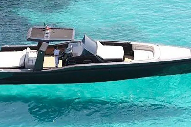  Yacht Photos Pics 2008 Maori 50 T-Top yacht on clear turquoise water, featuring sleek design and spacious deck.