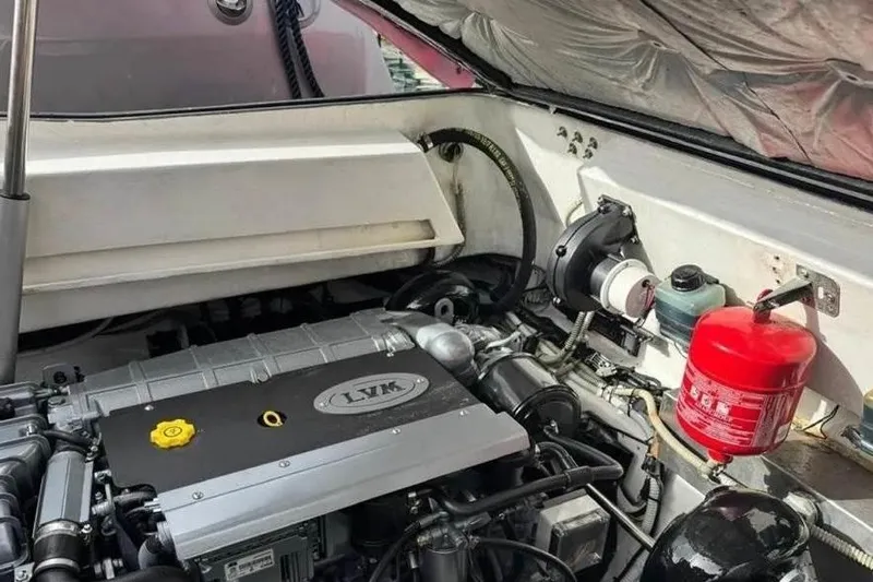  Yacht Photos Pics Engine compartment of a 2008 Maori 50 T-Top boat with visible fire extinguisher.