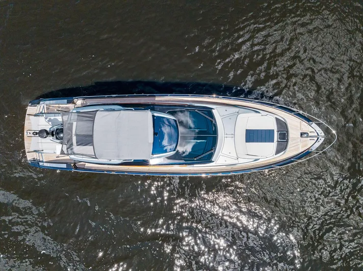 Knot Normal Yacht Photos Pics Aerial view of a 2020 Riva 66' Ribelle yacht on water.