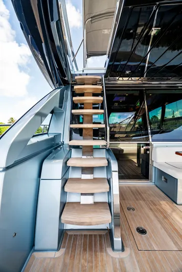 Knot Normal Yacht Photos Pics 2020 Riva 66' Ribelle yacht with wooden steps and modern interior.
