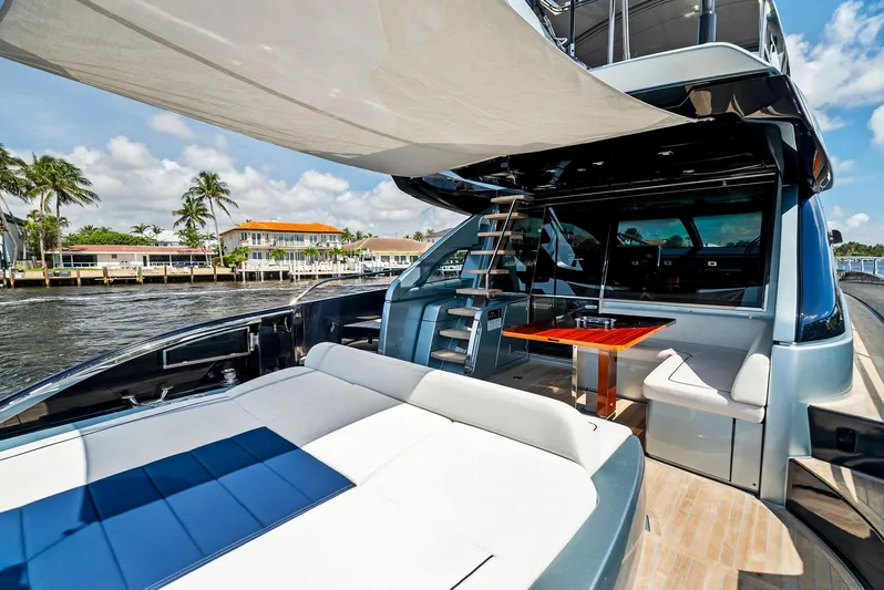 Knot Normal Yacht Photos Pics Luxury 2020 Riva 66' Ribelle yacht with spacious deck and waterfront view.