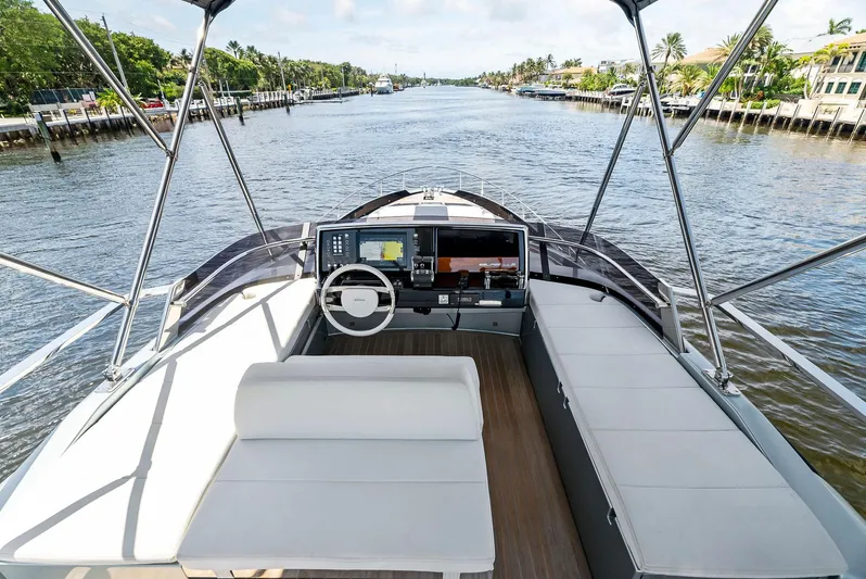 Knot Normal Yacht Photos Pics 2020 Riva 66' Ribelle yacht cockpit with modern navigation system and spacious seating.