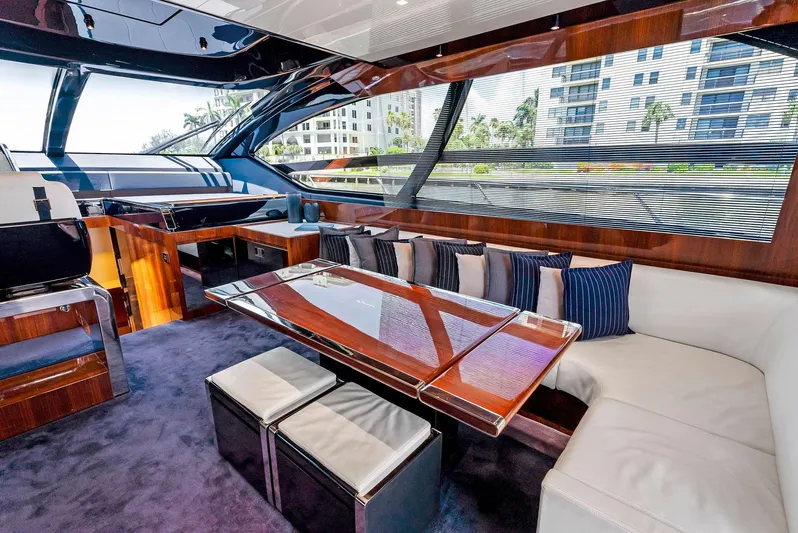 Knot Normal Yacht Photos Pics Luxurious interior of a 2020 Riva 66' Ribelle yacht with plush seating and modern design.