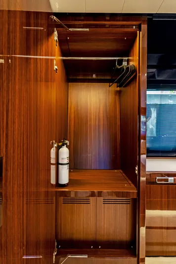 Knot Normal Yacht Photos Pics Luxurious wooden closet interior on a 2020 Riva 66' Ribelle yacht.