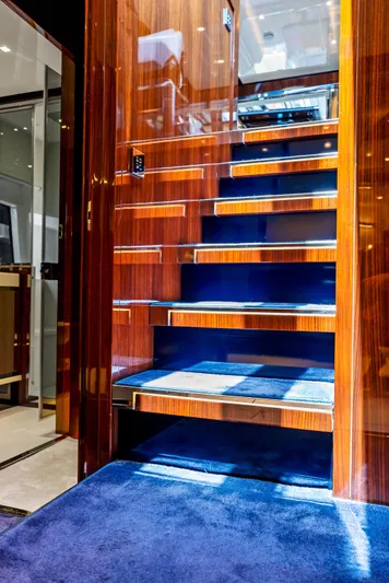 Knot Normal Yacht Photos Pics Luxurious wooden staircase inside 2020 Riva 66' Ribelle yacht.