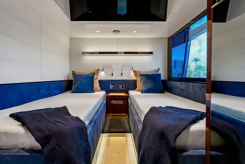 Knot Normal Yacht Photos Pics Luxurious twin cabin interior of 2020 Riva 66' Ribelle yacht with modern design.