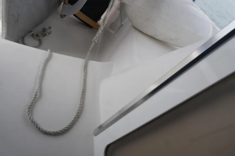  Yacht Photos Pics Deck view of 2006 Hunter 41 Deck Salon sailboat with rope and fender.