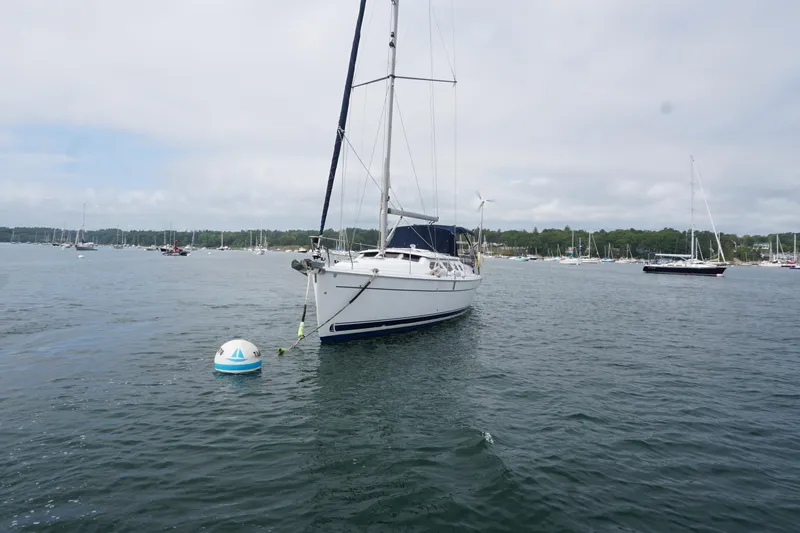  Yacht Photos Pics Sailboat Hunter 41 Deck Salon 2006 anchored in a scenic harbor.