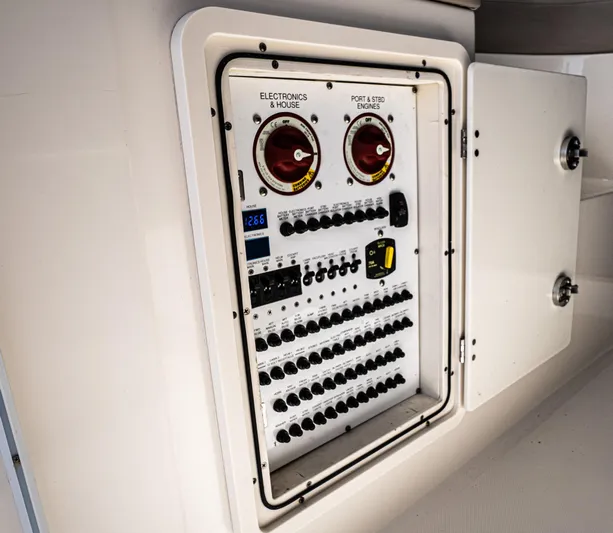 "nameless" Yacht Photos Pics Electrical control panel on a 2014 Pursuit SC 365i Sport Coupe boat.