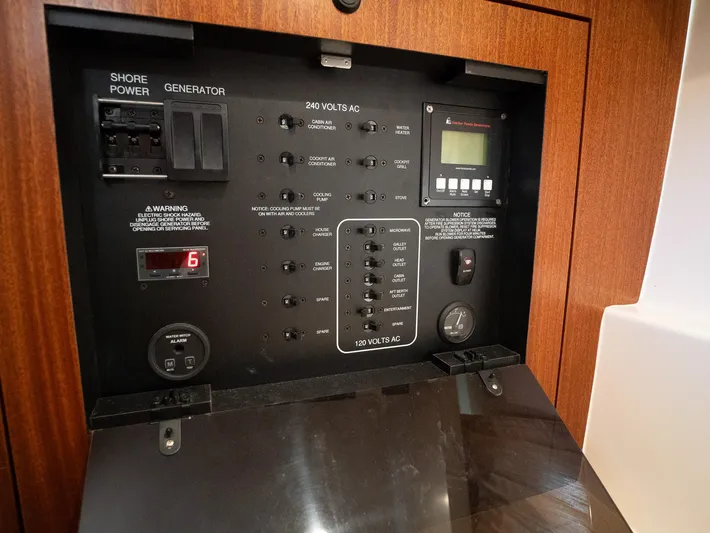 "nameless" Yacht Photos Pics Electrical control panel of a 2014 Pursuit SC 365i Sport Coupe boat.