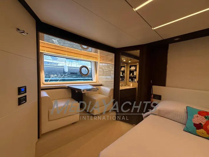  Yacht Photos Pics Luxurious interior of 2019 Azimut Fly 72 yacht with elegant seating and window view.