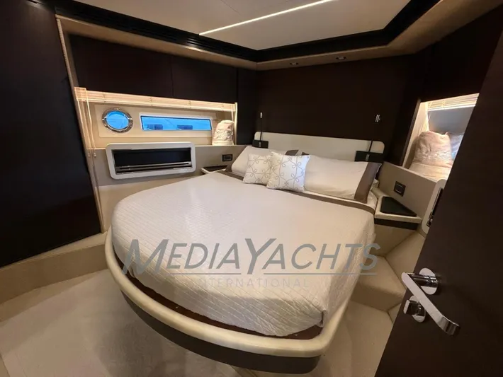  Yacht Photos Pics Luxurious bedroom interior of 2019 Azimut Fly 72 yacht with elegant design.