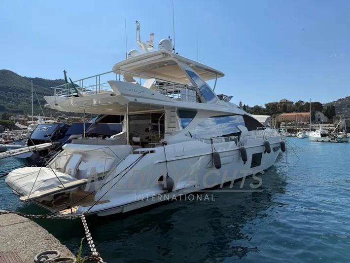  Yacht Photos Pics 2019 Azimut Fly 72 yacht docked in a scenic marina.